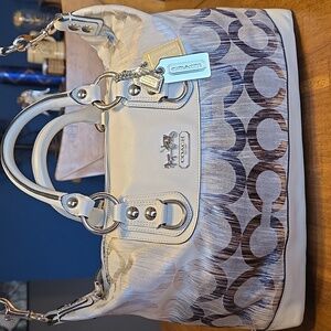 Coach Madison Op Art Sabrina satchel in the silver/gray multi-color finish.
